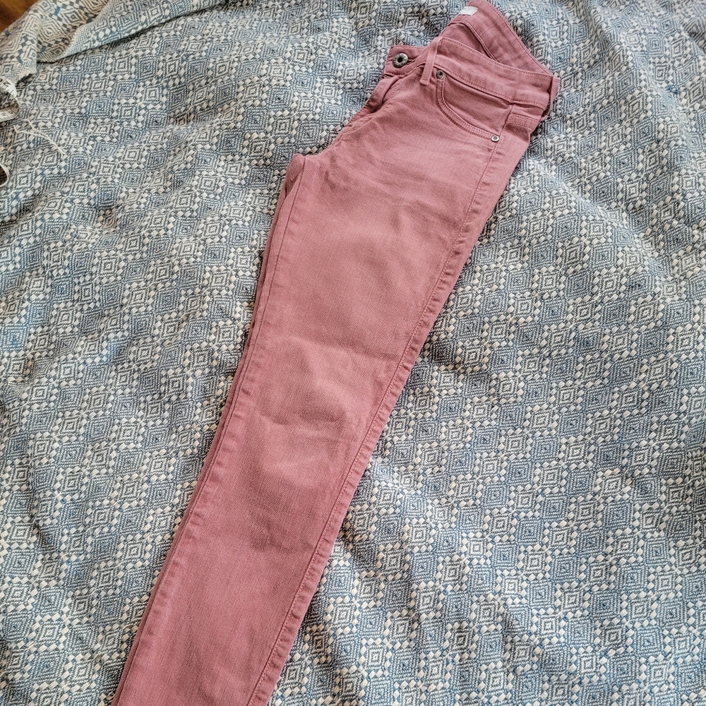 Dusty pink low rise skinny jeans